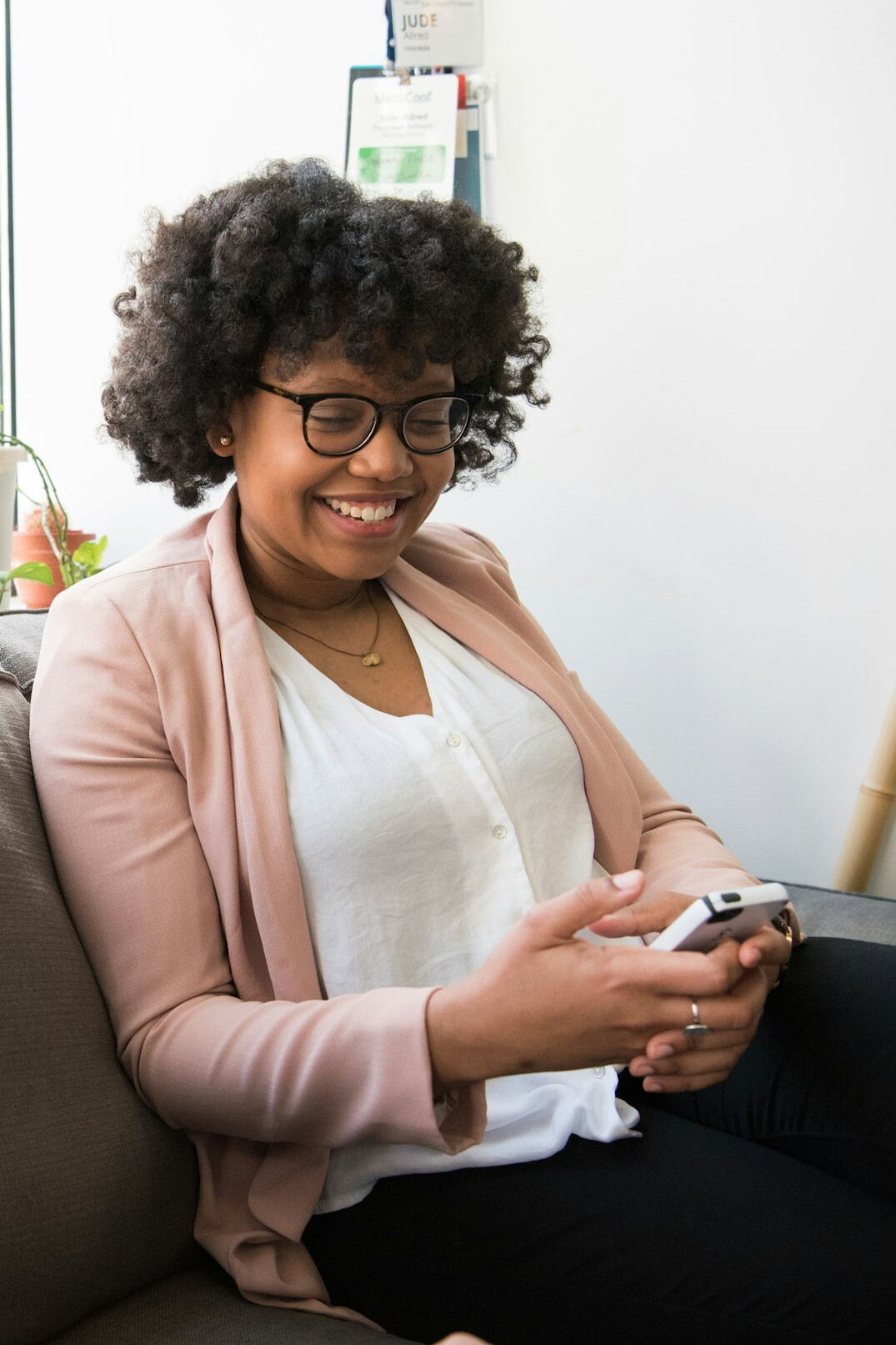 woman on phone discreetly