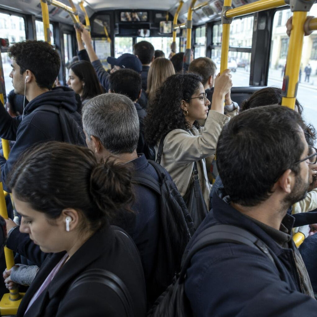 Crowded interior of a public bus during rush hour